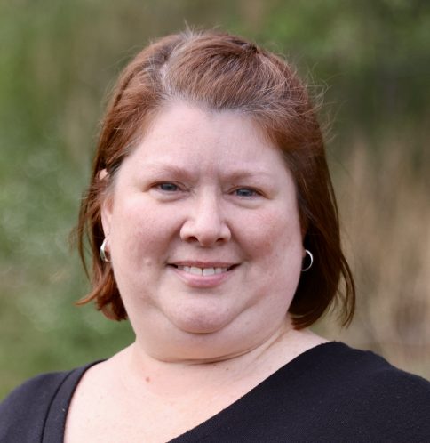 Kathleen Morrill, the child and family therapist smiling.